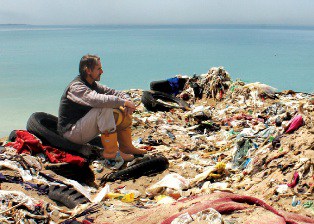 Jeremy Irons visits a polluted beach in Trashed  Blenheim Films 2012